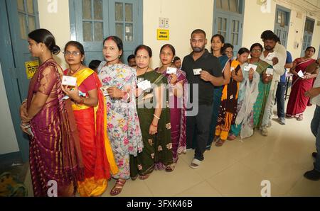 Constituency Example PATNA, INDIA - OCTOBER 23: Voters standing in queue for casting their ...