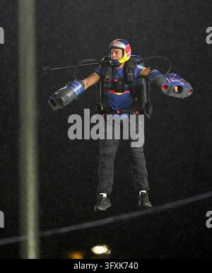 Intonation Example Picture Red Bulls Rocket Man performing on the pitch at half time during the ...
