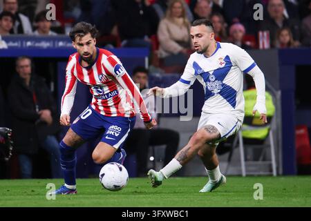 MADRID, SPAIN - OCTOBER 24: Alejandro Grimaldo of Atletico Madrid (L ...