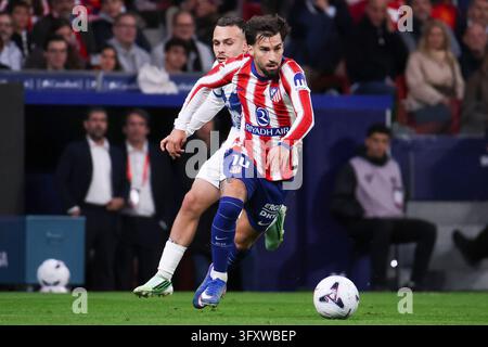 MADRID, SPAIN - OCTOBER 24: Alejandro Grimaldo of Atletico Madrid (R ...