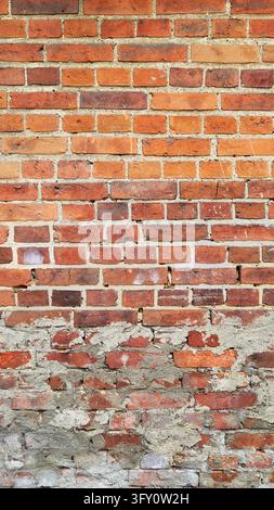 Photo of a weathered old brick wall. Stock Photo