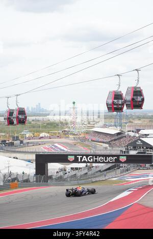 Red Bull Racing Ring Max Verstappen (NLD) (Oracle Red Bull Racing) on the podium after the ...
