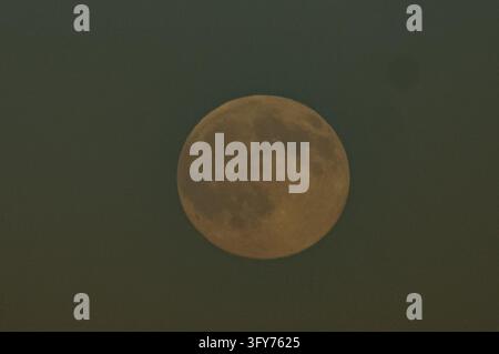 WASHINGTON, D.C., UNITED STATES - OCTOBER 25, 2026: Full Moon seen during the Full Hunter's Moon in Washington, D.C., United States. Photo by Ariel Peña / JNA Press. Stock Photo