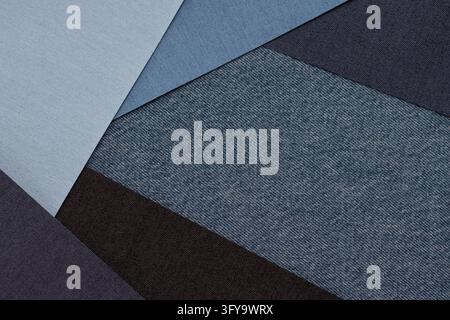 Overlapping blue and charcoal fabric swatches with woven textile texture. Abstract geometric pattern and material sample. Textile design, upholstery a Stock Photo