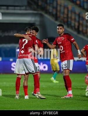 Competitive Advertising Stage Example Al Ahly players celebrate with Hussein El Shahat after he scores his ...