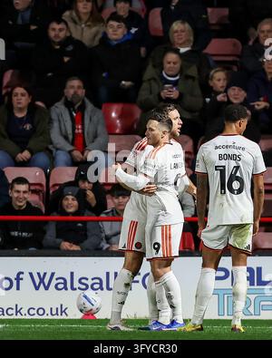 Salford City #9 Macaulay Langstaff battles with Walsall FC #26 Ryan ...