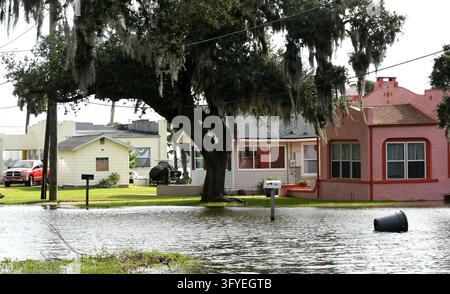 The Halifax River floods a street, the result of severe king tides ...