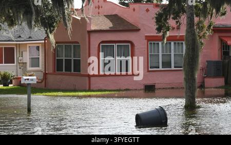 Water from the Halifax River floods a street, the result of severe king ...