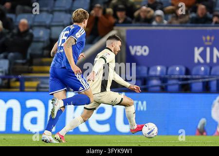Wigan Athletic #25 Scott Hogan races to intercept the pass by Leicester ...
