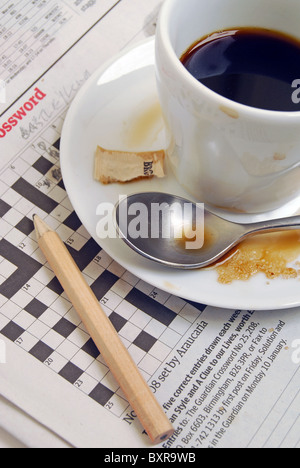 Crossword puzzle coffee break cryptic clues Stock Photo: 33704103 - Alamy