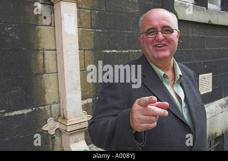 Portrait of a casually dressed businessman engaged in animated conversation Stock Photo