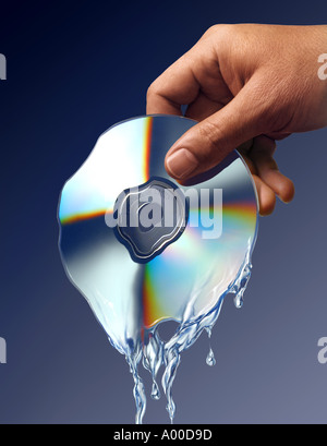 cd disc melting in hand Stock Photo