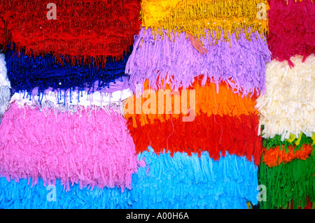 display of brightly coloured sarongs for sale at a shop in seminyak bali indonesia Stock Photo
