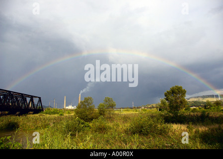 Rainbow over the most polluted town in Europe, Copsa Mica, Romania Stock Photo