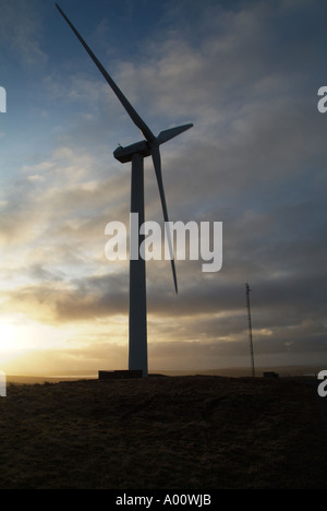 dh  ELECTRICITY UK Nordex wind turbines sunset dusk with storm clouds Burgar Hill Orkney Stock Photo