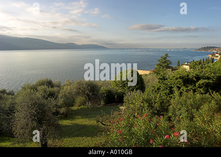Southern view Lake Garda from Gargnano with regatta in distance Stock Photo
