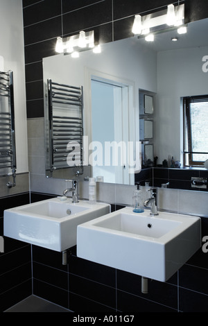wash basins in modern en suite bathroom Stock Photo
