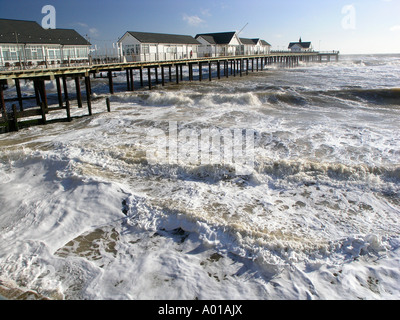 The restored pier hammered by a rough sea on a winter day Southwold Suffolk England Stock Photo