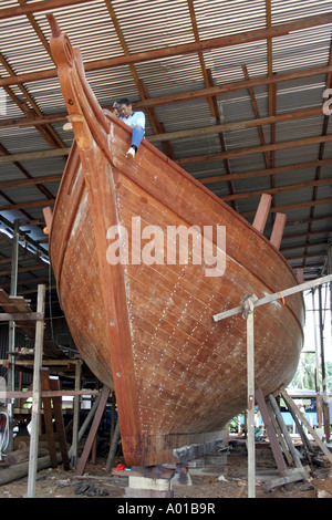 A wooden boat under construction in Terengganu, Malaysia. Stock Photo