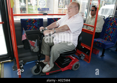 Miami Beach Florida,public bus,coach,senior seniors old citizen citizens pensioner pensioners retired elderly,White man,disabled disability handicappe Stock Photo
