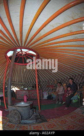 Mongolian family in national dwelling called ger or yurt. Delger Moron River nearby. Khuvsgul aimag (province). North Mongolia Stock Photo