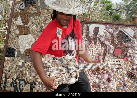 Miami Florida,Coconut Grove,Mad Hatter Arts Festival,festivals,celebration,fair,Black Blacks African Africans ethnic minority,adult adults man men mal Stock Photo