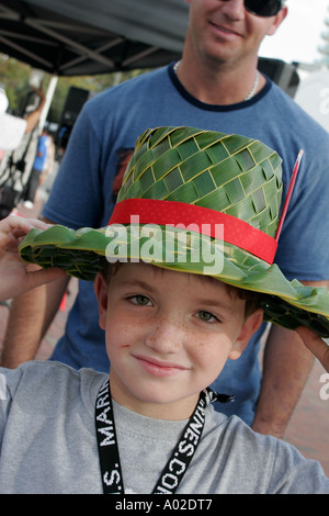 Miami Florida,Coconut Grove,Mad Hatter Arts Festival,festivals,celebration,fair,boy boys lad lads male kid kids child children,adult adults man men,pa Stock Photo