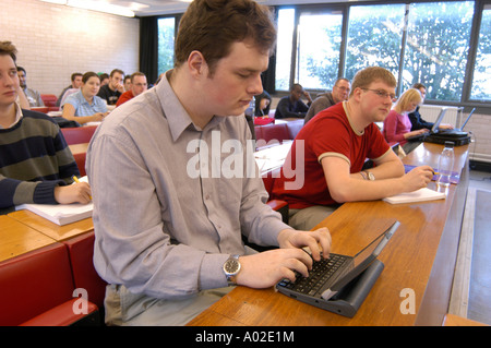 Department of Law University of Wales Aberystwyth lecture - student taking notes on laptop computer during the class, UK Stock Photo