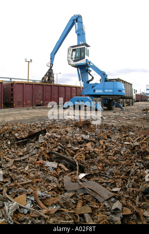 Fuchs MHL 350 loader unloading scrap metal from a train in the uk Stock Photo