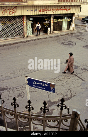 A lone pedestrian on a street in Tehran Iran Stock Photo