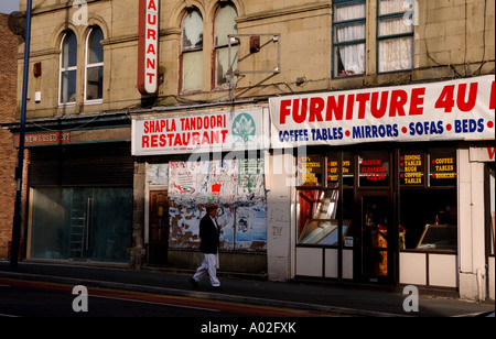 Boarded up shops and restaurants in Bradford Yorkshire UK Stock Photo