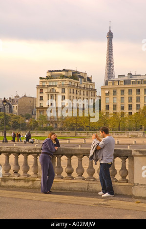 Tourists near Invalides metro station with Eiffel tower in the background in Paris the capital of France EU Stock Photo