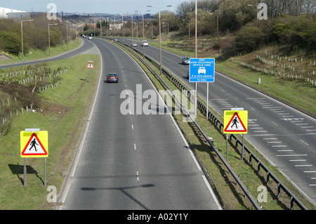 High occupancy vehicle lane sign to encourage car sharing among commuting drivers in the uk Stock Photo