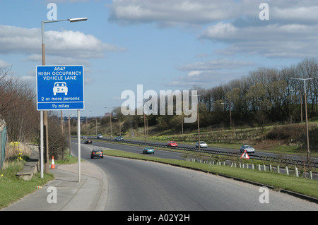 High occupancy vehicle lane sign to encourage car sharing among commuting drivers in the uk Stock Photo