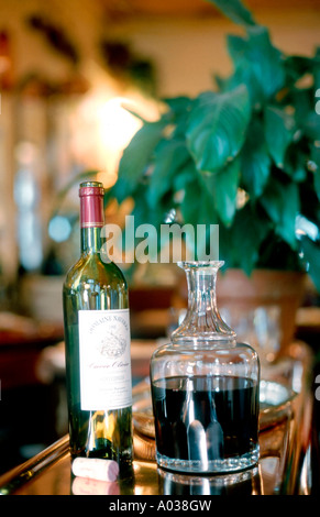 Paris France, Detail Red Wine Bottle of Natural Red 'French WIne' on top of Bar in a Old Bistro Restaurant organic wines, vintage interior bar Stock Photo