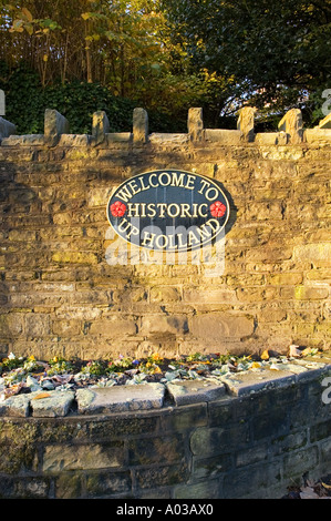 Sign displaying Welcome to Historic Upholland in Lancashire England UK Stock Photo