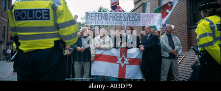 BNP (British National Party) protesters supp leader Nick Griffin and party activist Mark Collett outside Leeds Crown court. Leeds 25 July 2005. Stock Photo