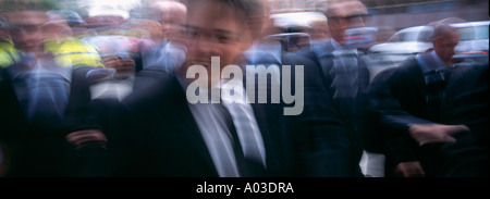 BNP (British National Party) leader  Nick Griffin (Centre)  and party activist Mark Collett attend Leeds Crown court. Leeds 25 July 2005. Stock Photo