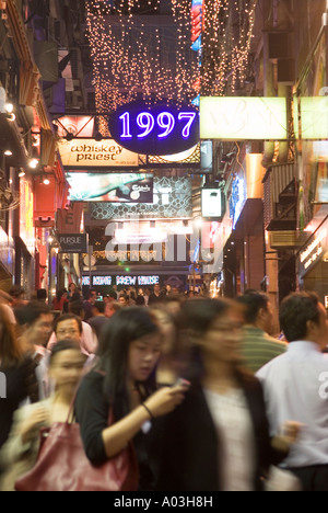 Crowds on the street of the  famous Lan Kwai Fong entertainment district Hong Kong Stock Photo