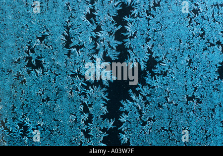 Ice Patterns on Outhouse Window glass Stock Photo