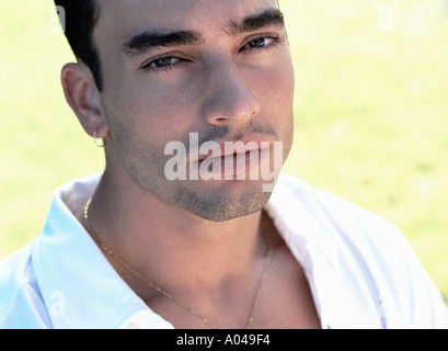 Portrait of a young man wearing a white shirt Stock Photo