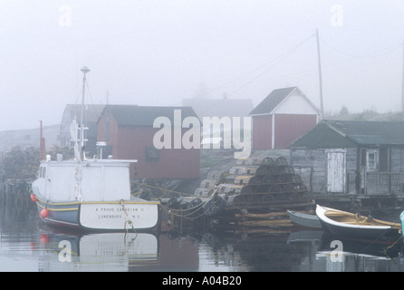 Fishing boats in fog near Lunenberg  Nova Scotia  Canada Stock Photo