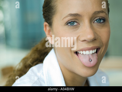 Professional woman, showing pierced tongue, portrait Stock Photo