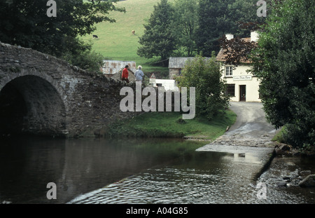 Lorna Doone Farm & Malmsmead stone bridge water splash ford in Badgworthy Water river Exmoor National Park on border of Devon & Somerset England UK Stock Photo