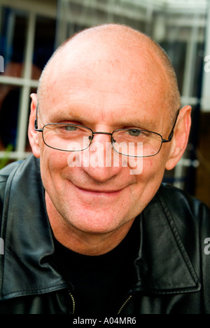 Cool looking older man with shaven head Stock Photo