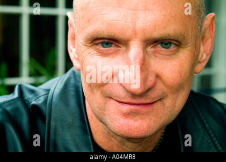 Cool looking older man with shaven head Stock Photo