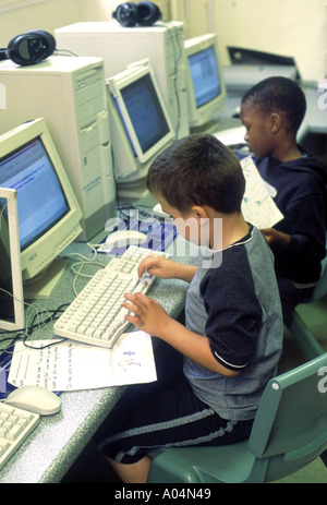 primary school boy working in the playground garden Stock Photo - Alamy