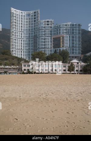 dh  REPULSE BAY HONG KONG Tall apartment block old colonial building on beach skyscrapers island Stock Photo