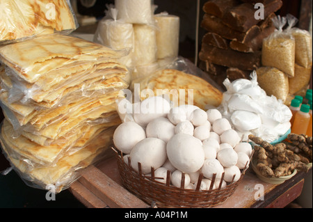 Pimba, cassava bread and other foodstuffs for sale in the central market of Paramaribo, Suriname. Stock Photo