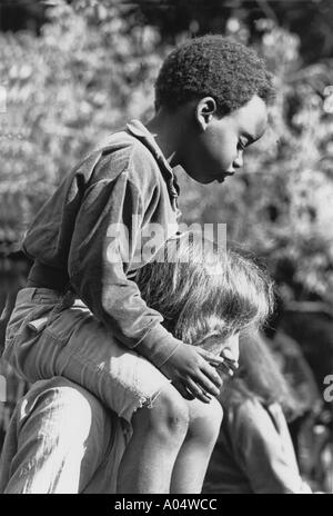 Black father and daughter holding piggy bank, close up Stock Photo - Alamy